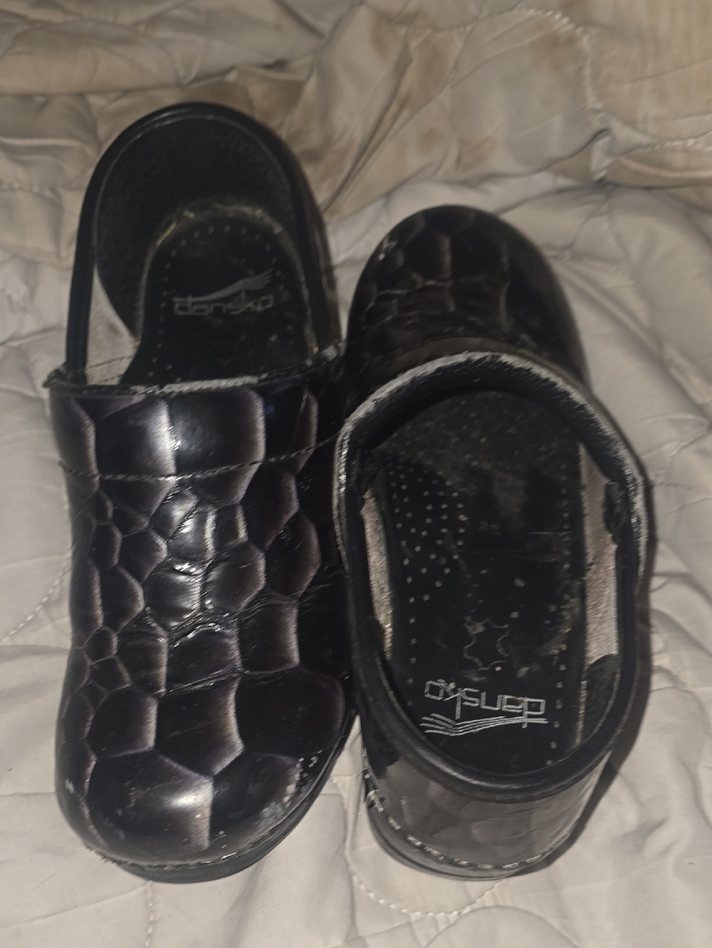 Dansko Black Textured Patent Clogs